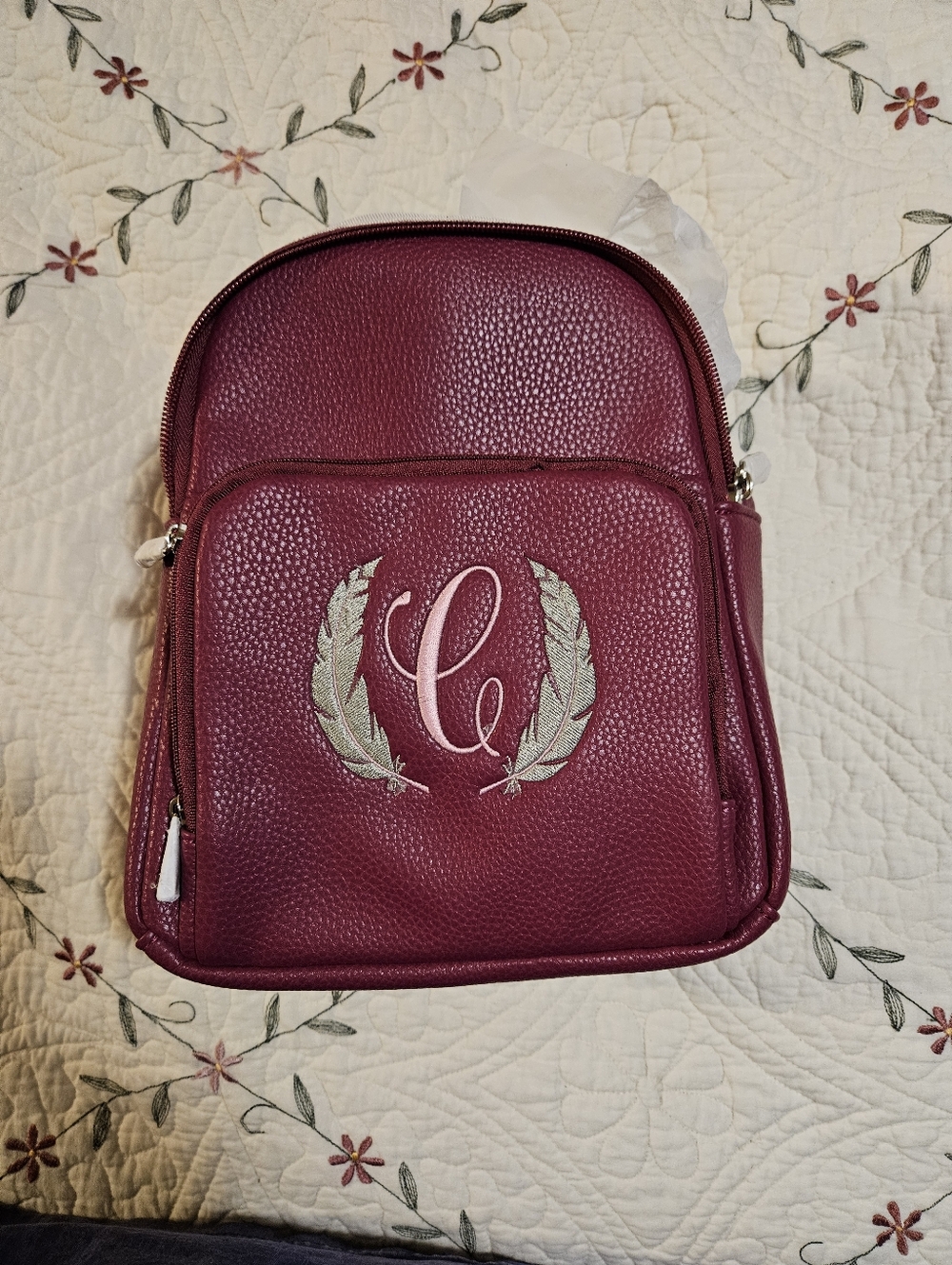 thirty-one Burgundy Pebbled Backpack with Silver Feather Monogram